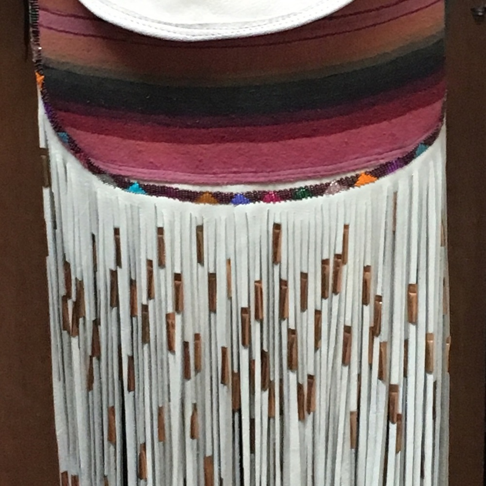 Our custom hand made bag with serape and beading,